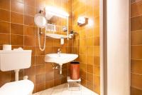 Ein Badezimmer in der Unterkunft Hotel Gasthof Lercher