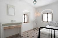 A bed or beds in a room at Precioso apartamento en Vejer con terraza