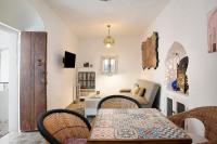 A television and/or entertainment centre at Precioso apartamento en Vejer con terraza