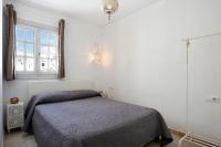 A bed or beds in a room at Precioso apartamento en Vejer con terraza