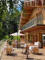 a camera on a tripod in front of a restaurant at Chalet Morel 1586 Hotel & Spa in Limone Piemonte