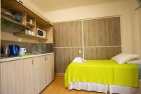 Kuchyňa alebo kuchynka v ubytovaní Rea Hotel