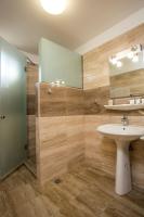 Kúpeľňa v ubytovaní Rea Hotel