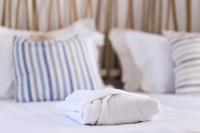 Posteľ alebo postele v izbe v ubytovaní Isalos Villas Naxos