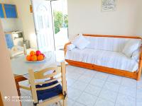 Postel nebo postele na pokoji v ubytování Evangelia House Sea View Apartments