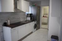 Kuchyň nebo kuchyňský kout v ubytování Vialia Apartments