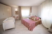 Posteľ alebo postele v izbe v ubytovaní Il Cortiletto - Appartamento Lores