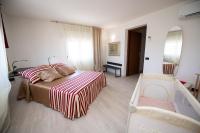 Posteľ alebo postele v izbe v ubytovaní Il Cortiletto - Appartamento Lores