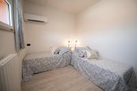 Posteľ alebo postele v izbe v ubytovaní Il Cortiletto - Appartamento Lores
