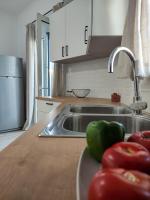 Kuchyňa alebo kuchynka v ubytovaní Aeraki House