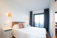 Postel nebo postele na pokoji v ubytování Apartaments Voralmar