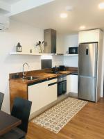 Kuchyň nebo kuchyňský kout v ubytování Apartaments Voralmar