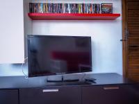 A television and/or entertainment centre at VILLA ISELLA