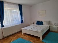 Posteľ alebo postele v izbe v ubytovaní Apartman Nataly
