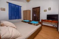 Postel nebo postele na pokoji v ubytování Apartments Jelka