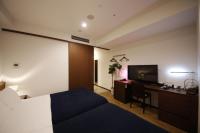 ゾンクホテル博多にあるテレビまたはエンターテインメントセンター