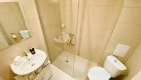 A bathroom at APARTELLO Modern Apartment - Balkan Breeze 7