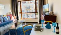 A television and/or entertainment centre at APARTELLO Modern Apartment - Balkan Breeze 7