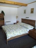 Postel nebo postele na pokoji v ubytování Guest House Kuks