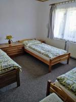 Postel nebo postele na pokoji v ubytování Guest House Kuks