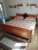 Postel nebo postele na pokoji v ubytování Guest House Kuks