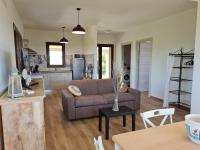 A kitchen or kitchenette at Alghero - House with Panoramic View immersed in full nature