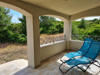 A balcony or terrace at Alghero - House with Panoramic View immersed in full nature