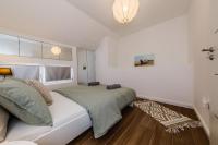 Postel nebo postele na pokoji v ubytování Apartment Maestral