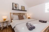Postel nebo postele na pokoji v ubytování Apartment Maestral