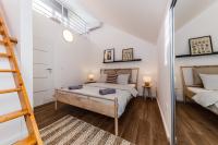 Postel nebo postele na pokoji v ubytování Apartment Maestral