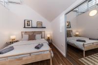 Postel nebo postele na pokoji v ubytování Apartment Maestral