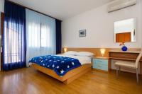 Postel nebo postele na pokoji v ubytování Apartmani Braut