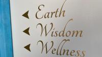 a sign that says earth melatonin wellness at Het Lichthuis in Zandvoort