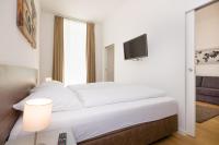 Posteľ alebo postele v izbe v ubytovaní Vienna Stay Apartments Tabor 1020
