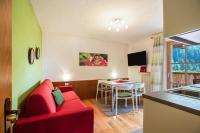 Televízia a/alebo spoločenská miestnosť v ubytovaní Appartements Gabrielli Marie