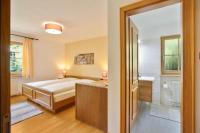 Posteľ alebo postele v izbe v ubytovaní Appartements Gabrielli Marie