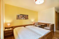 Posteľ alebo postele v izbe v ubytovaní Appartements Gabrielli Marie