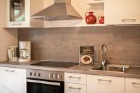 Kuchyňa alebo kuchynka v ubytovaní Appartements Gabrielli Marie