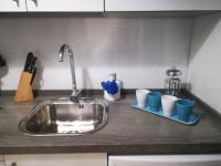 Kuchyňa alebo kuchynka v ubytovaní Apartamento Pastora Sevilla