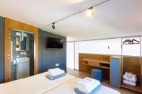 Łóżko lub łóżka w pokoju w obiekcie Terrazzo Luxury Villas