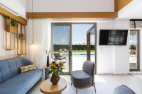 Telewizja i/lub zestaw kina domowego w obiekcie Terrazzo Luxury Villas