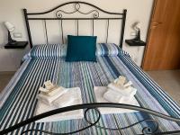 Posteľ alebo postele v izbe v ubytovaní Casa Nonna Anna
