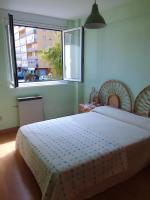 Postel nebo postele na pokoji v ubytování APARTAMENTOS RAMÓN