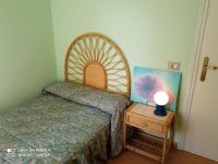 Postel nebo postele na pokoji v ubytování APARTAMENTOS RAMÓN