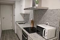Kuchyňa alebo kuchynka v ubytovaní Apartamentos Credencial