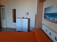 A bed or beds in a room at APPARTAMENTO CASA MARCO