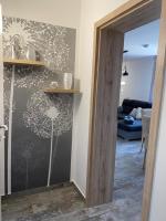 Posteľ alebo postele v izbe v ubytovaní Dióliget Cottage Sárvár