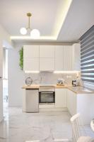 Kuchyň nebo kuchyňský kout v ubytování Elegant Central Apartment Veria - με ενδοδαπέδια θέρμανση!!!