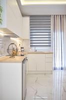 Kuchyň nebo kuchyňský kout v ubytování Elegant Central Apartment Veria - με ενδοδαπέδια θέρμανση!!!