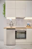 Kuchyň nebo kuchyňský kout v ubytování Elegant Central Apartment Veria - με ενδοδαπέδια θέρμανση!!!